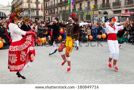 BARCELONA, CATALONIA - MARCH 2, 2014: Dancing people at Carnival Balls at Placa Comercial in Barcelona