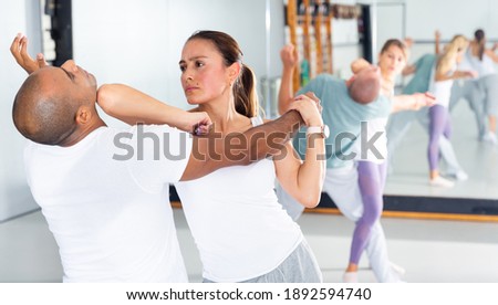 Similar – Image, Stock Photo unarmed close combat since the beginning