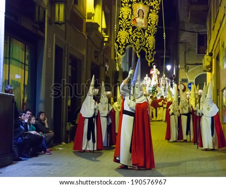 MURCIA, SPAIN - APRIL 15, 2014: Night procession during Semana Santa in Murcia.  Holy Week is Christian religious processions on  streets of Spanish cities and town