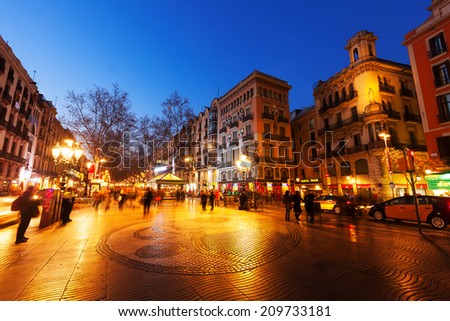 BARCELONA, SPAIN - MARCH 13, 2014: Night view of Rambla in Barcelona