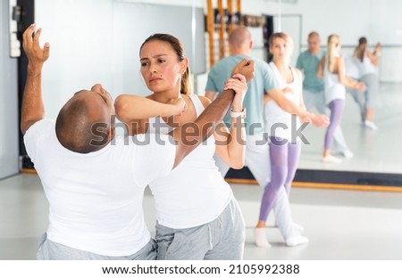 Similar – Image, Stock Photo unarmed close combat since the beginning