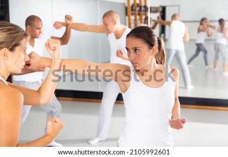 Similar – Image, Stock Photo unarmed close combat since the beginning