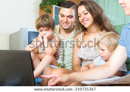 Young family of four people listening to offers insurance agent