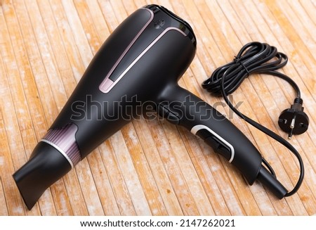 Similar – Image, Stock Photo Hairdresser tools over a many color and natural wigs