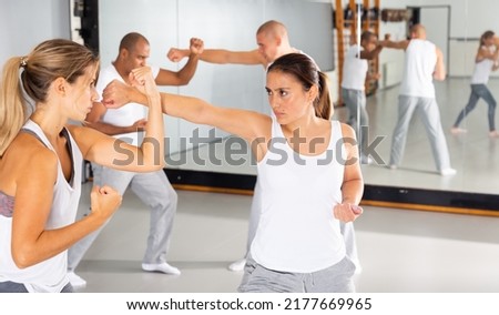 Similar – Image, Stock Photo unarmed close combat since the beginning