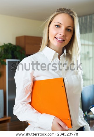 Woman in business outfit in home interior