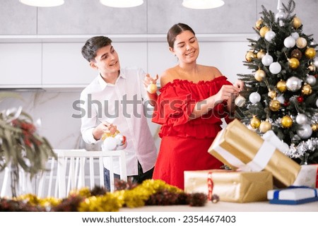 Similar – Image, Stock Photo Young couple enjoying Christmas Lights