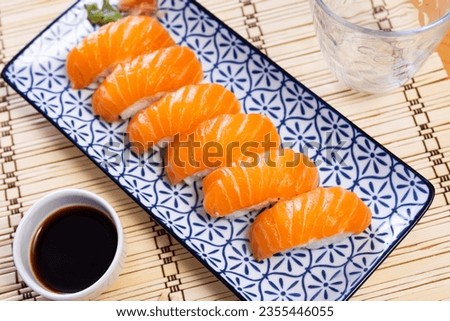 Similar – Image, Stock Photo Norwegian nigiri with salmon and wasabi