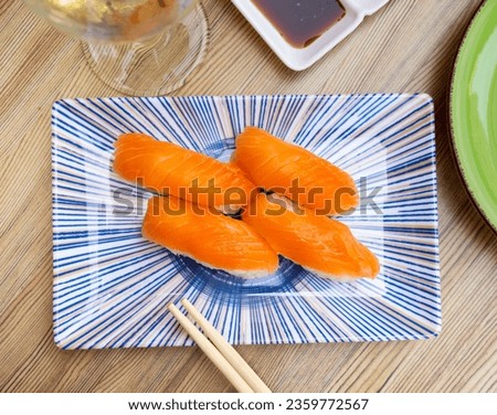 Similar – Image, Stock Photo Norwegian nigiri with salmon and wasabi