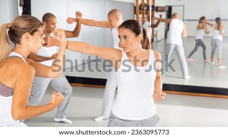 Similar – Image, Stock Photo unarmed close combat since the beginning