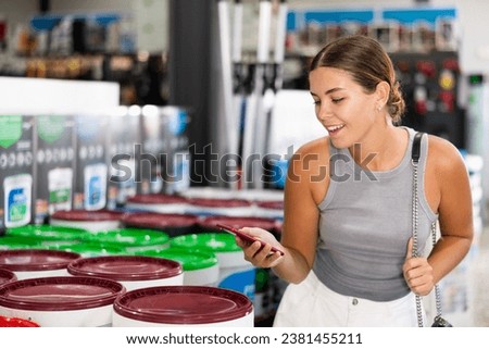 Similar – Image, Stock Photo Cheerful woman preparing paint during renovation