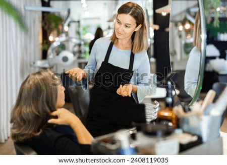 Similar – Image, Stock Photo Hairdresser and client at hair salon