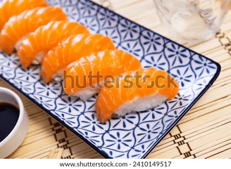 Similar – Image, Stock Photo Norwegian nigiri with salmon and wasabi