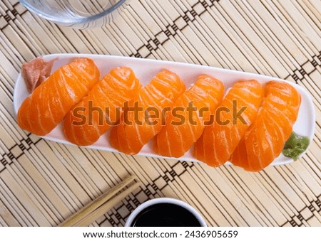 Similar – Image, Stock Photo Norwegian nigiri with salmon and wasabi