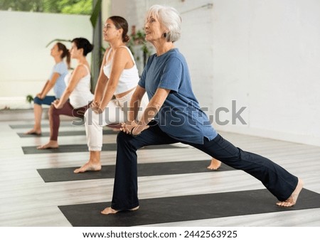 Similar – Image, Stock Photo Senior woman exercising at home