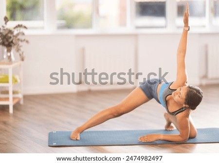 Similar – Foto Bild Schlanke Frau macht Yoga in Berg-Pose mit erhobenem Arm