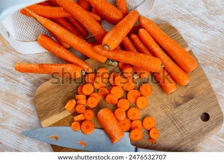 Similar – Image, Stock Photo Raw carrots on rustic wooden background