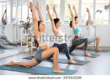 Similar – Image, Stock Photo Woman practicing pilates pose Cobra in park on summer