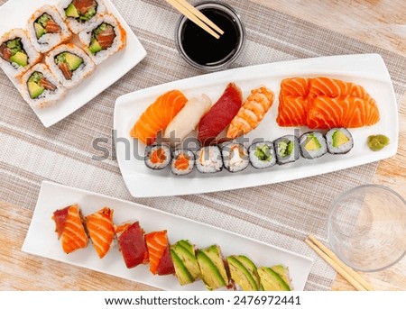 Similar – Image, Stock Photo Delicious Sushi Plates in Restaurant