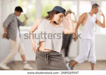 Similar – Image, Stock Photo Slim woman during hip workout near sea