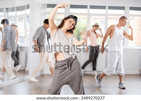 Similar – Image, Stock Photo Slim woman during hip workout near sea