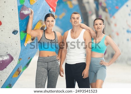 Similar – Image, Stock Photo Woman rock climbing indoors.