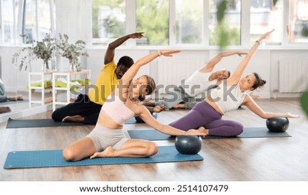 Similar – Image, Stock Photo Concentrated and enthusiastic girl plays table hockey.