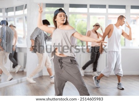 Similar – Image, Stock Photo Slim woman during hip workout near sea