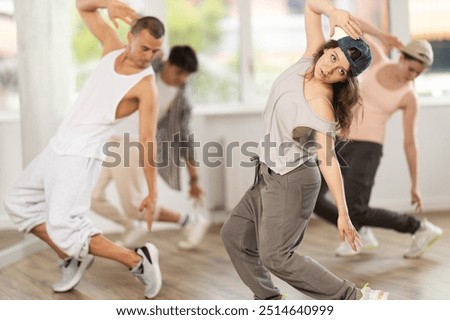 Similar – Image, Stock Photo Slim woman during hip workout near sea