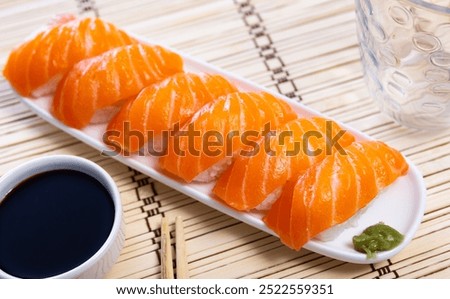 Similar – Image, Stock Photo Norwegian nigiri with salmon and wasabi