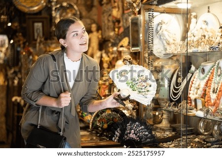 Similar – Image, Stock Photo Curious female on vacation travelling by coastal train