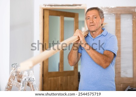 Similar – Image, Stock Photo Aged repairman in professional workshop with tools