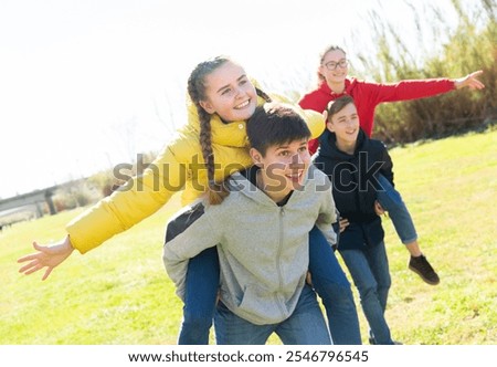 Similar – Image, Stock Photo Cheerful teenager having fun with jet of water