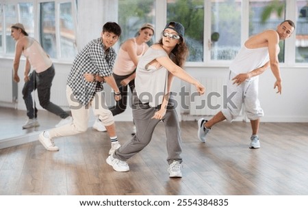 Similar – Image, Stock Photo Slim woman during hip workout near sea