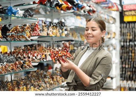 Similar – Image, Stock Photo Curious female on vacation travelling by coastal train