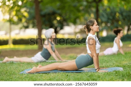 Similar – Image, Stock Photo Sportive woman performing yoga pose in room