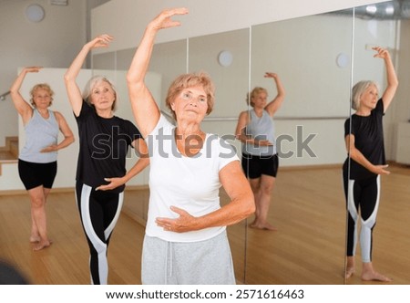 Similar – Image, Stock Photo Graceful woman dancing near wall in street