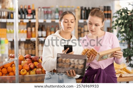 Similar – Image, Stock Photo Woman buying sweets in cupcakery