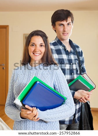 Portrait of happy student couple