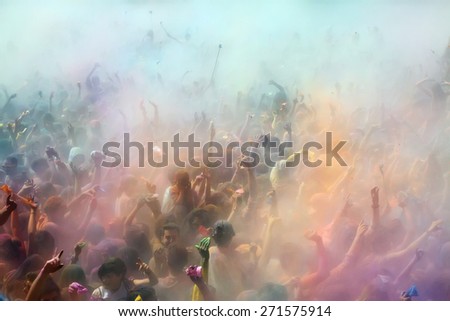 BARCELONA, SPAIN - APRIL 12, 2015: Dirty people during   Festival of colours Holy at Barcelona. Holi is traditional holiday of India