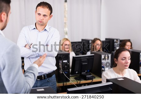 Strict boss and clerk at open space working area