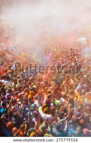 BARCELONA, SPAIN - APRIL 12, 2015: Happy dirty people at Festival de los colores Holi at Barcelona. It is traditional holiday  of India