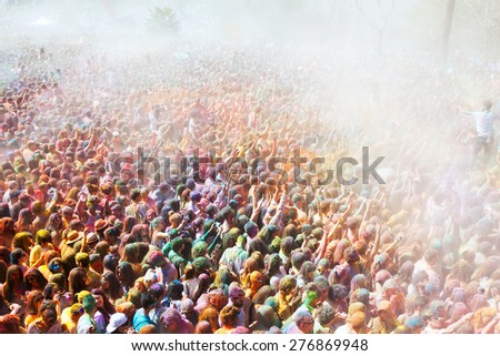 BARCELONA, SPAIN - APRIL 12, 2015: Many dirty people at Festival de los colores Holi at Barcelona. It is traditional holiday  of India