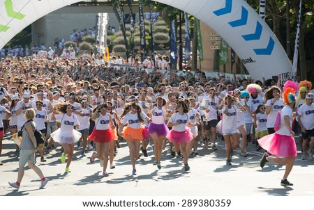 BARCELONA, SPAIN - JUNE 7, 2015: Happy people running at The Color Run, also known as the Happiest 5k on the Planet,
