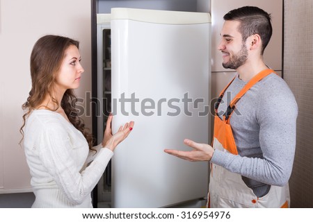 Professional workman visiting customer for after-sales service