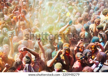 BARCELONA, SPAIN - APRIL 12, 2015: Dirty people during   Festival of  Holy at Barcelona. Holi is traditional holiday of India