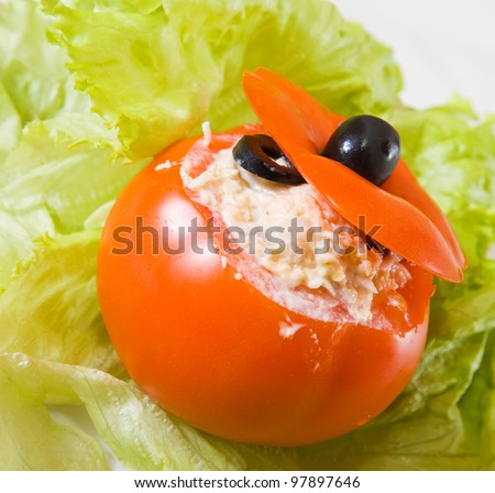 stuffed tomato salad. See in series stages of cooking of stuffed tomato