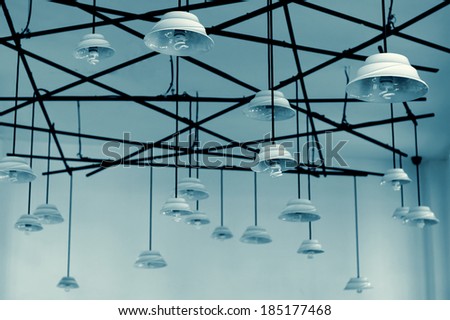 lamps hanging from high ceiling