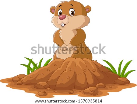 Cartoon funny groundhog standing outside its burrow