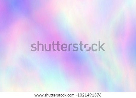 Very beautiful iridescent paper. Holographic Foil. Wonderful magic background. Colorful wallpaper. Rainbow abstract sky. Trendy art